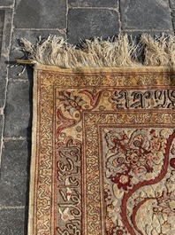 A Turkish Hereke rug with floral design in silk and gold thread, 20th C.