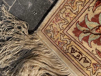 A Turkish Hereke rug with floral design in silk and gold thread, 20th C.