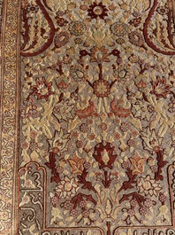 A Turkish Hereke rug with floral design in silk and gold thread, 20th C.