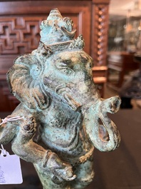 Un Bouddha et un Ganesh Majapahit en bronze oxyd&eacute;, Java de l'Est, 13&egrave;me/14&egrave;me si&egrave;cle