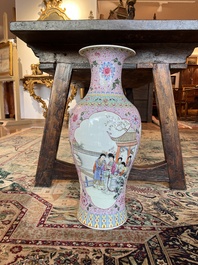 A Chinese famille rose baluster vase with female Immortals and floral design, Qianlong mark, 20th C.
