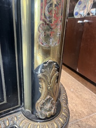 A French Historicism gilt bronze mounted tortoiseshell and brass marquetry ebonised wooden Boulle three-door credenza, 19th C.