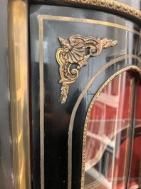 A French Historicism gilt bronze mounted tortoiseshell and brass marquetry ebonised wooden Boulle three-door credenza, 19th C.