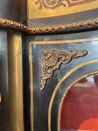 A French Historicism gilt bronze mounted tortoiseshell and brass marquetry ebonised wooden Boulle three-door credenza, 19th C.