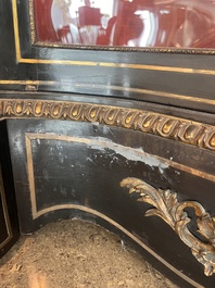 A French Historicism gilt bronze mounted tortoiseshell and brass marquetry ebonised wooden Boulle three-door credenza, 19th C.