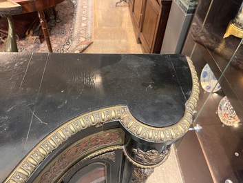 A French Historicism gilt bronze mounted tortoiseshell and brass marquetry ebonised wooden Boulle three-door credenza, 19th C.