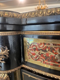 A French Historicism gilt bronze mounted tortoiseshell and brass marquetry ebonised wooden Boulle three-door credenza, 19th C.