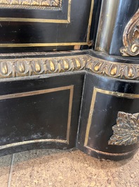 A French Historicism gilt bronze mounted tortoiseshell and brass marquetry ebonised wooden Boulle three-door credenza, 19th C.