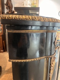 A French Historicism gilt bronze mounted tortoiseshell and brass marquetry ebonised wooden Boulle three-door credenza, 19th C.