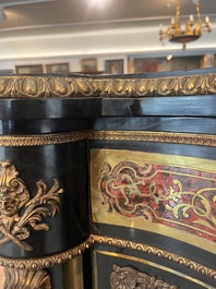 A French Historicism gilt bronze mounted tortoiseshell and brass marquetry ebonised wooden Boulle three-door credenza, 19th C.
