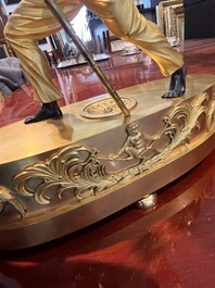 Pendule de chemin&eacute;e en bronze patin&eacute; et dor&eacute; &agrave; d&eacute;cor de 'bon sauvage', France, premi&egrave;re moiti&eacute; du 19&egrave;me si&egrave;cle