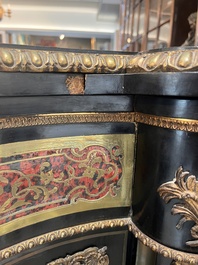 A French Historicism gilt bronze mounted tortoiseshell and brass marquetry ebonised wooden Boulle three-door credenza, 19th C.