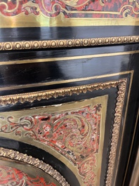 A French Historicism gilt bronze mounted tortoiseshell and brass marquetry ebonised wooden Boulle three-door credenza, 19th C.