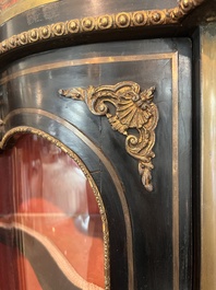 A French Historicism gilt bronze mounted tortoiseshell and brass marquetry ebonised wooden Boulle three-door credenza, 19th C.