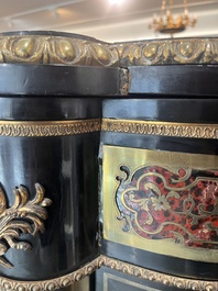 A French Historicism gilt bronze mounted tortoiseshell and brass marquetry ebonised wooden Boulle three-door credenza, 19th C.