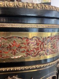 A French Historicism gilt bronze mounted tortoiseshell and brass marquetry ebonised wooden Boulle three-door credenza, 19th C.