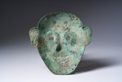A Chinese bronze burial mask, probably Liao