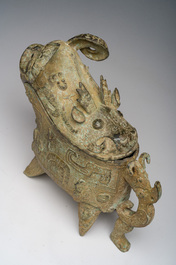A Chinese bronze mythical animal and a 'guang' ewer, 20th C.