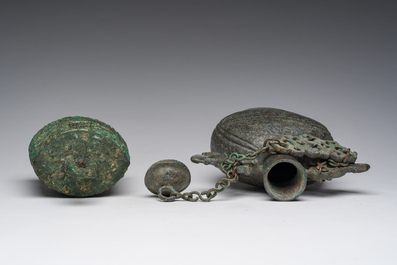 A Chinese bronze 'bianhu' vase and a 'zhong' bell, possibly Han and Western Zhou Dynasty