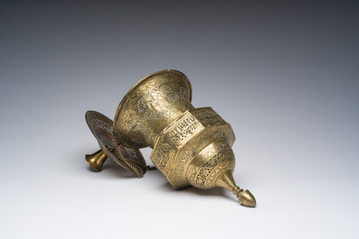 An engraved and reticulated brass Mamluk style hanging lantern, Egypt or Syria, 19th C.