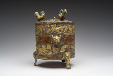 A Chinese parcel-gilt copper tripod 'zun' archaic vessel, probably 17th/18th C.