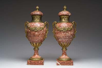 A pair of gilt bronze mounted red marble cassolettes, 19th/20th C.
