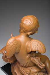A pair of biscuit busts of Louis XVI and Marie-Antoinette and a patinated 'Cupid' group after Pigalle, 19th/20th C.