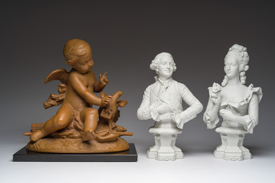 A pair of biscuit busts of Louis XVI and Marie-Antoinette and a patinated 'Cupid' group after Pigalle, 19th/20th C.