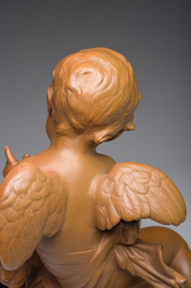 A pair of biscuit busts of Louis XVI and Marie-Antoinette and a patinated 'Cupid' group after Pigalle, 19th/20th C.