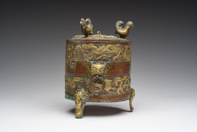 A Chinese parcel-gilt copper tripod 'zun' archaic vessel, probably 17th/18th C.