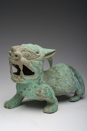 A Chinese bronze mythical animal and a 'guang' ewer, 20th C.