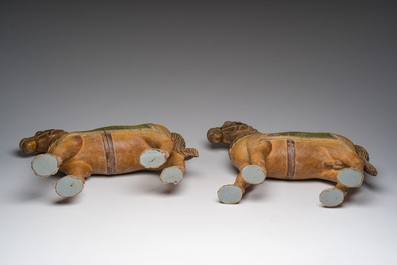 Two Indian partly polychromed wooden sculptures of horses, 20th C.