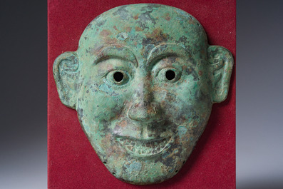A Chinese bronze burial mask, probably Liao