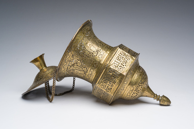An engraved and reticulated brass Mamluk style hanging lantern, Egypt or Syria, 19th C.