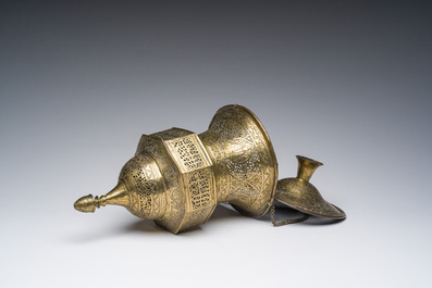 An engraved and reticulated brass Mamluk style hanging lantern, Egypt or Syria, 19th C.