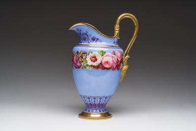 A Louis Philippe S&egrave;vres porcelain ewer with floral design on a blue ground, blue star mark, dated 1832