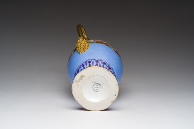 A Louis Philippe S&egrave;vres porcelain ewer with floral design on a blue ground, blue star mark, dated 1832