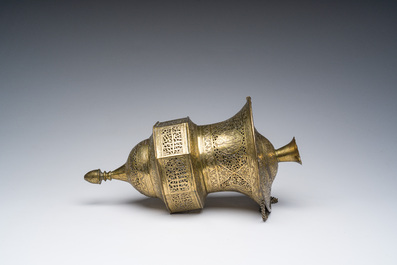 An engraved and reticulated brass Mamluk style hanging lantern, Egypt or Syria, 19th C.