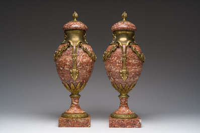 A pair of gilt bronze mounted red marble cassolettes, 19th/20th C.