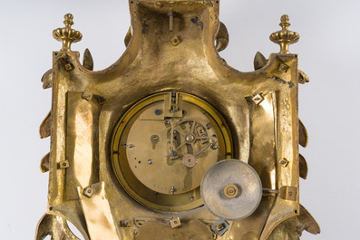 A French gilt bronze Louis XVI style cartel clock with a mascaron and floral design, Collin &agrave; Paris, 19th C.