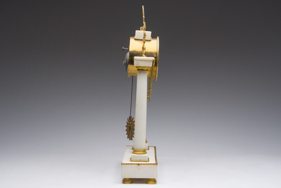 A French Neoclassical gilt bronze mounted white marble portico clock, 19th C.