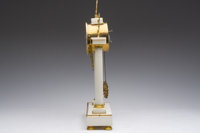 A French Neoclassical gilt bronze mounted white marble portico clock, 19th C.