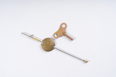 A French gilt bronze Louis XVI style cartel clock with a mascaron and floral design, Collin &agrave; Paris, 19th C.