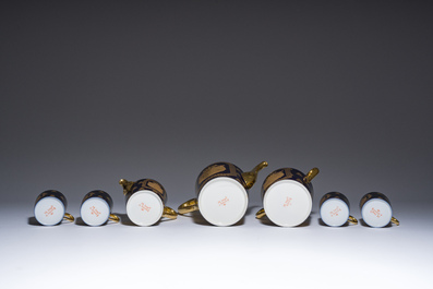 A 27-piece porcelain coffee service with the arms of the Second French Empire under Napoleon III, S&egrave;vres mark, France, 19th C.