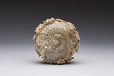 A small Chinese ritual axe, a water jar and a pendant in jade and hardstone, possibly Liangzhu or Han