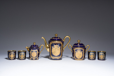 A 27-piece porcelain coffee service with the arms of the Second French Empire under Napoleon III, S&egrave;vres mark, France, 19th C.