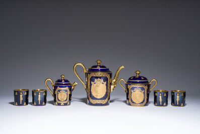 A 27-piece porcelain coffee service with the arms of the Second French Empire under Napoleon III, S&egrave;vres mark, France, 19th C.