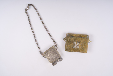 21 silver Tuareg pendants and two Koran boxes in silver and copper, Nigeria, Mali and Morocco, 19th/20th C.