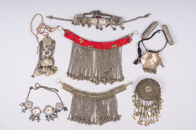A collection of ethnographic silver, copper, glass and enamel jewelry, 19th/20th C.