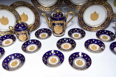 A 27-piece porcelain coffee service with the arms of the Second French Empire under Napoleon III, S&egrave;vres mark, France, 19th C.